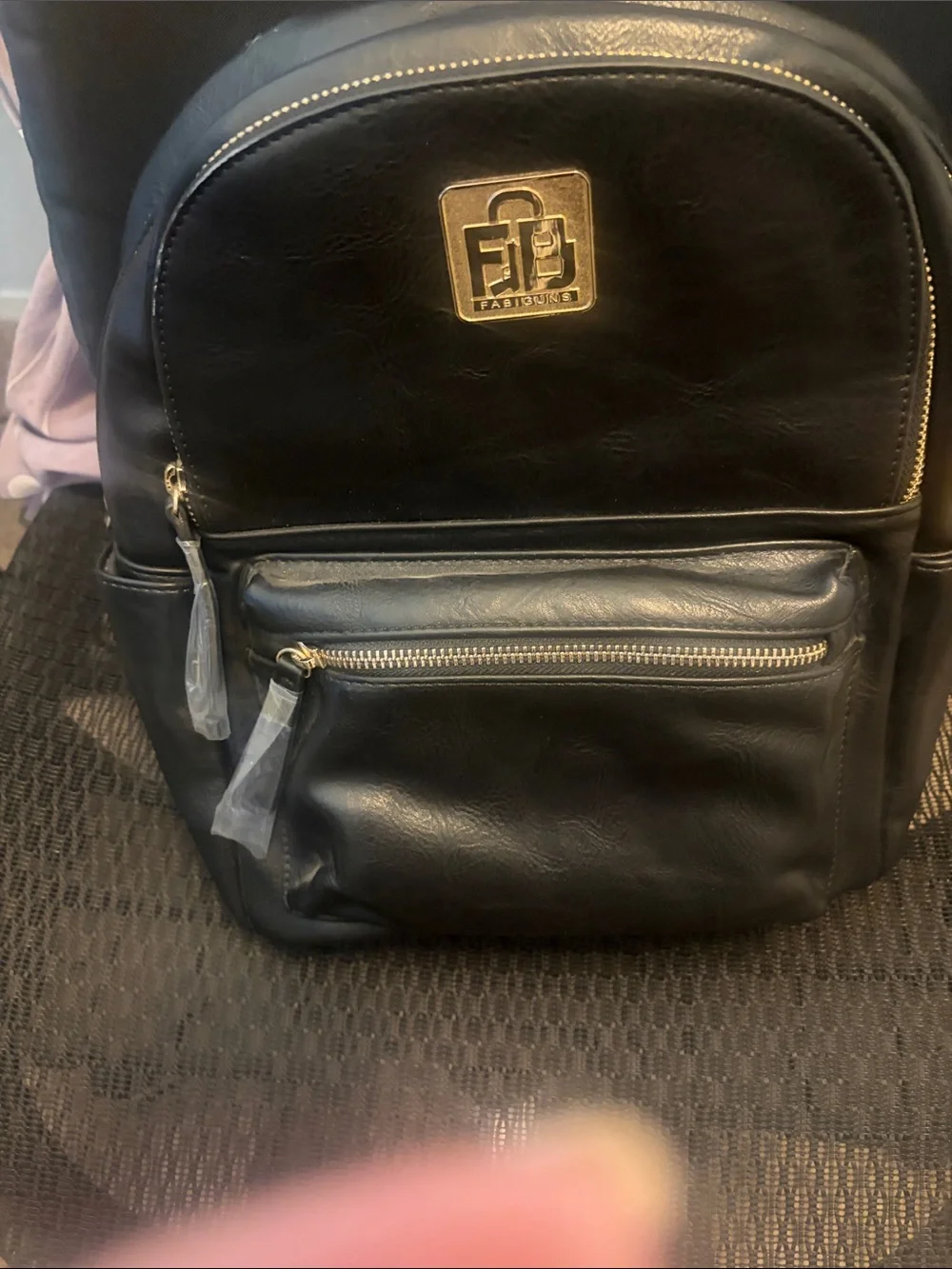 Black Men's Backpack with Gold Trim